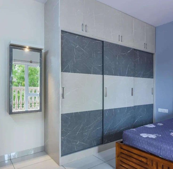 Textured grey sliding wardrobe design